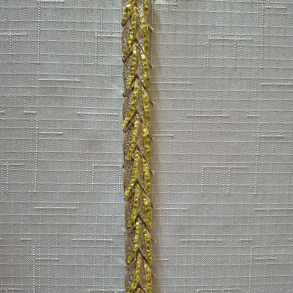 Gold-plated bracelet with pale green stones